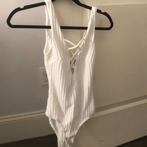 White body cross body suit!